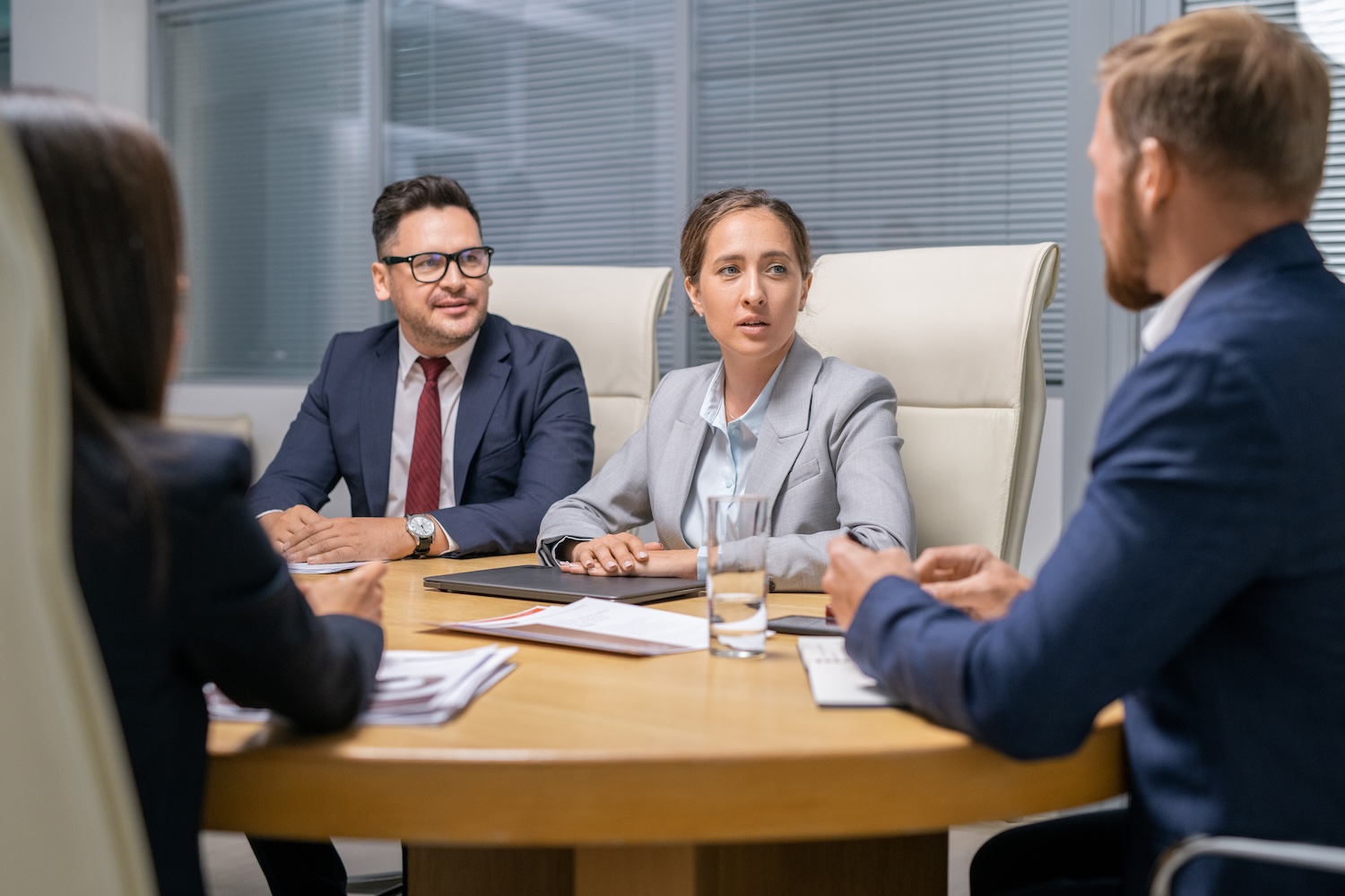 Group of professionals meeting in a boardroom